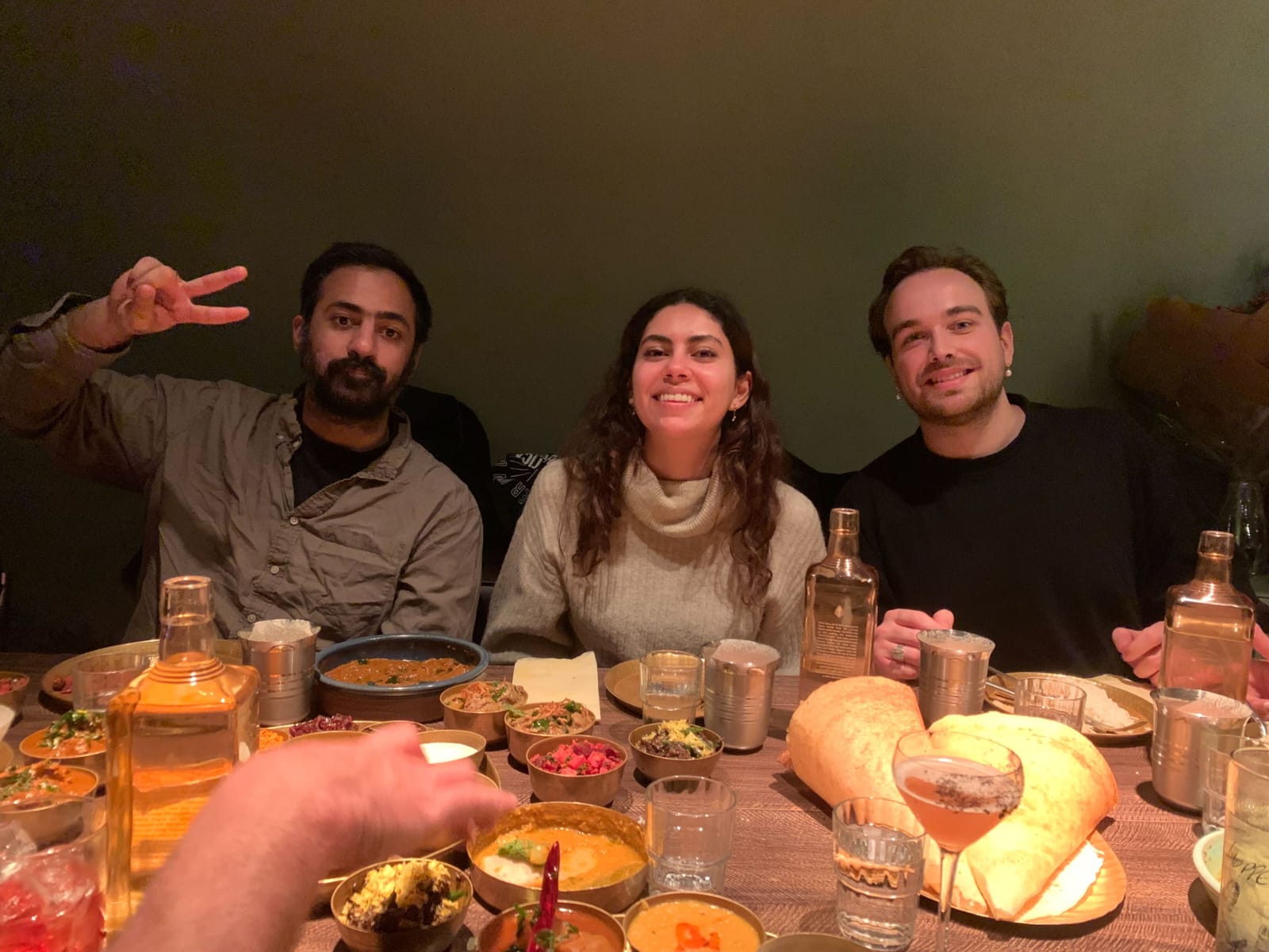 Satyn at dinner with friends